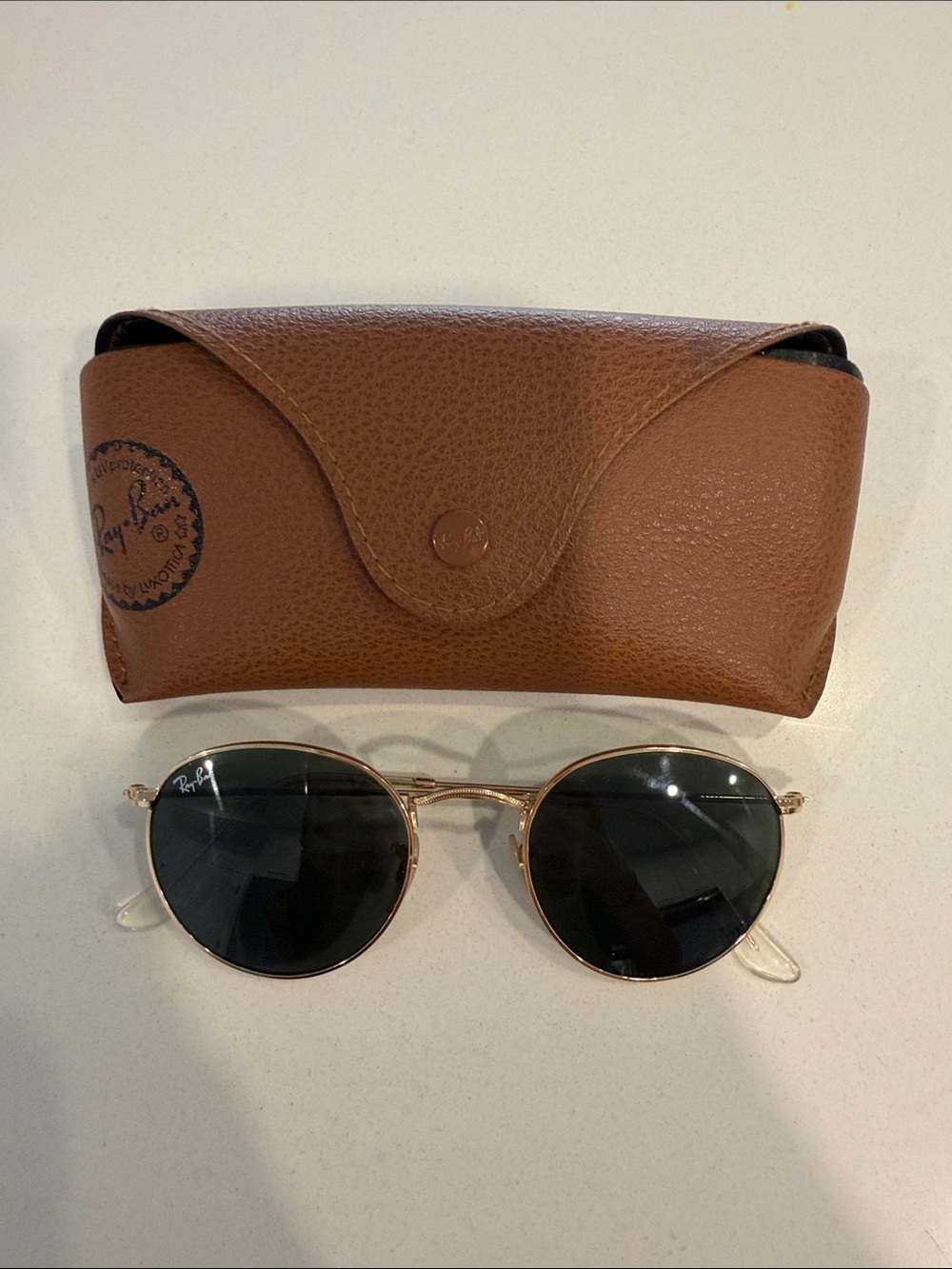 Ray-Ban Gold Frame Sunglasses with Black Lenses and Brown Case